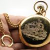 Westclox Pocket Watch The Conductor with Train Engraved on Back with Chain with Belt Hoop Clasp and Display Stand Included circa 1970s