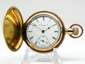 Lady’s Antique Elgin Pocket or Pendant Watch Size 6 Housed in a Beautifully Engraved Yellow Gold Fill Hunter Case circa 1905