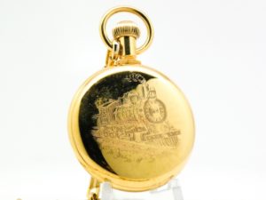Westclox Pocket Watch the Conductor with Train Engraved on Back and Original Chain with Display Stand Included circa 1970s