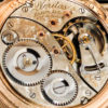 A close up of the movement of the Elgin Grade 239 showing the serial number, the jewel count and some fine engravings on the movement.